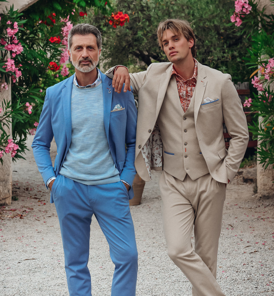 2 man standing in suits