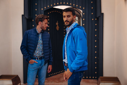 A fish named Fred - Sportive jacket - Men's sporty blue jacket with vibrant artistic prints and fish hook detail by A Fish Named Fred, premium mens fashion.
