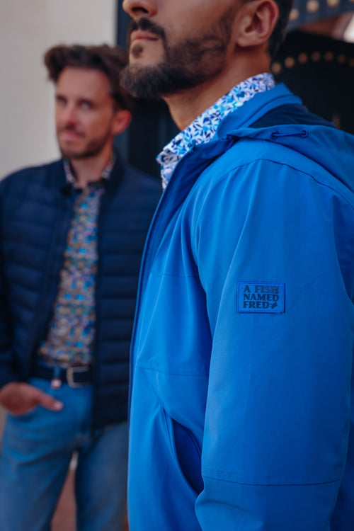 A fish named Fred - Sportive jacket - Blue sportive jacket with hood, A Fish Named Fred logo patch, worn with artistic printed shirt and premium mens fashion.