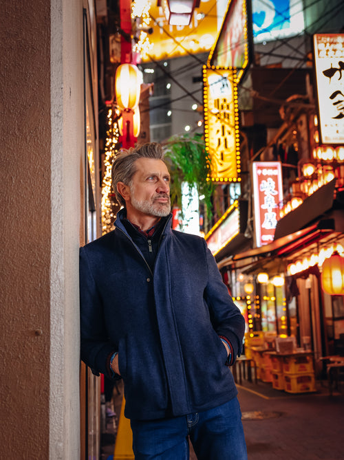 A Fish Named Fred men's Short Funnel Neck Coat in Navy, worn by a model in Tokyo