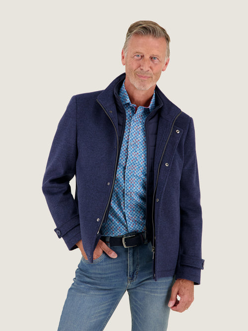 A Fish Named Fred men's Short Funnel Neck Coat in Navy, worn by a model, studio shot