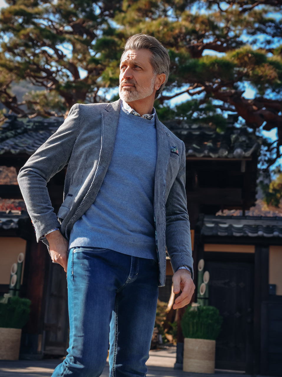 A Fish Named Fred men's Pullover Classic in Ash Blue, worn by a model in Japan